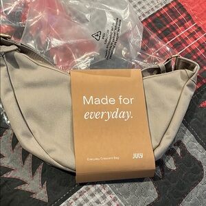 Tan Shoulder Bag with Crescent Shape for Everyday Use